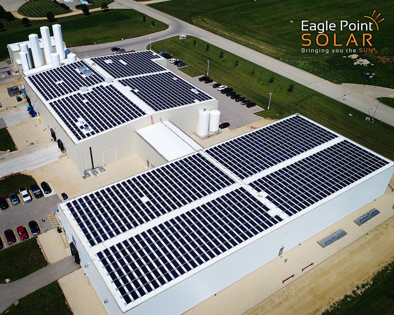Photo of commercial roof mounted solar array on Emmi roth