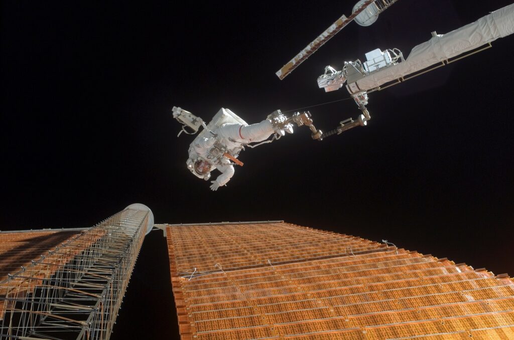 astronaut floating around international space station