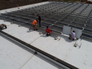 crew installing solar panels