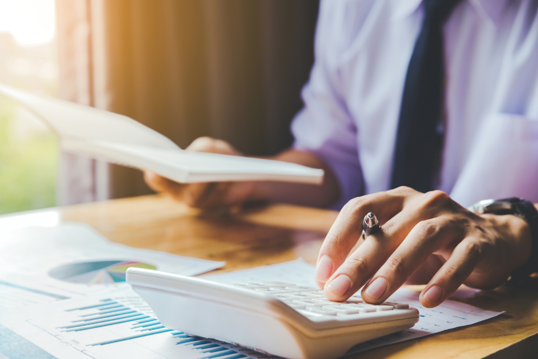 man calculating finances