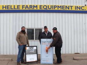 The Helle Farm Equipment staff with the Eagle Point Solar staff.