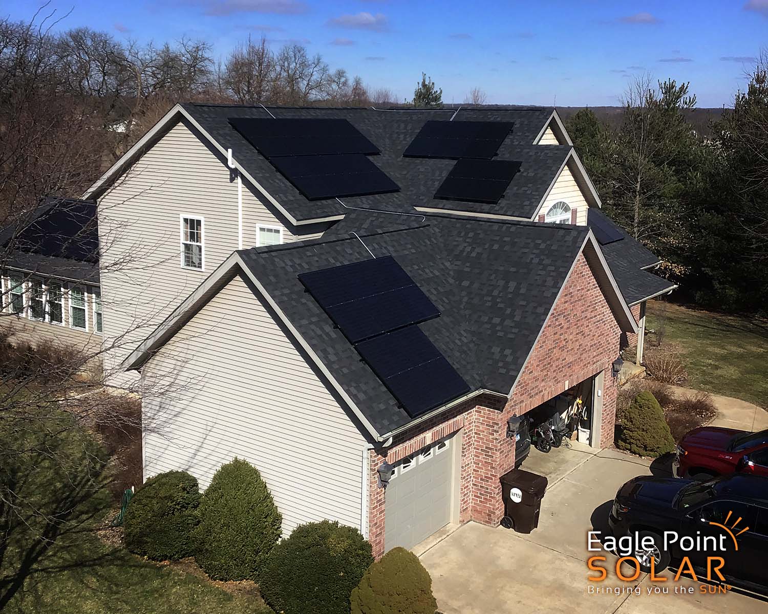 Image that shows the roof of a residential home with a solar array on top of it.