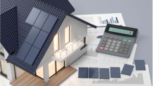 A model of a house with solar panels next to a calculator